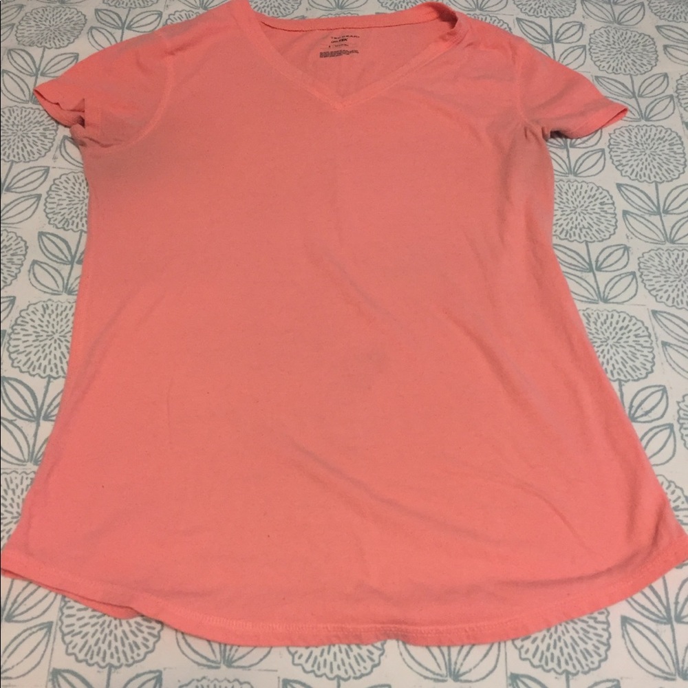 Coral colored Tek Gear shirt